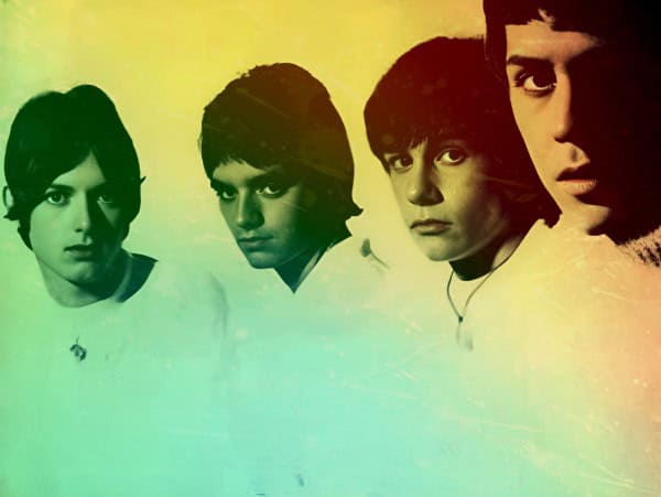 Girls with band members, vintage black-and-white photo with color overlay, representing music history and archival sound recordings on Past Daily.