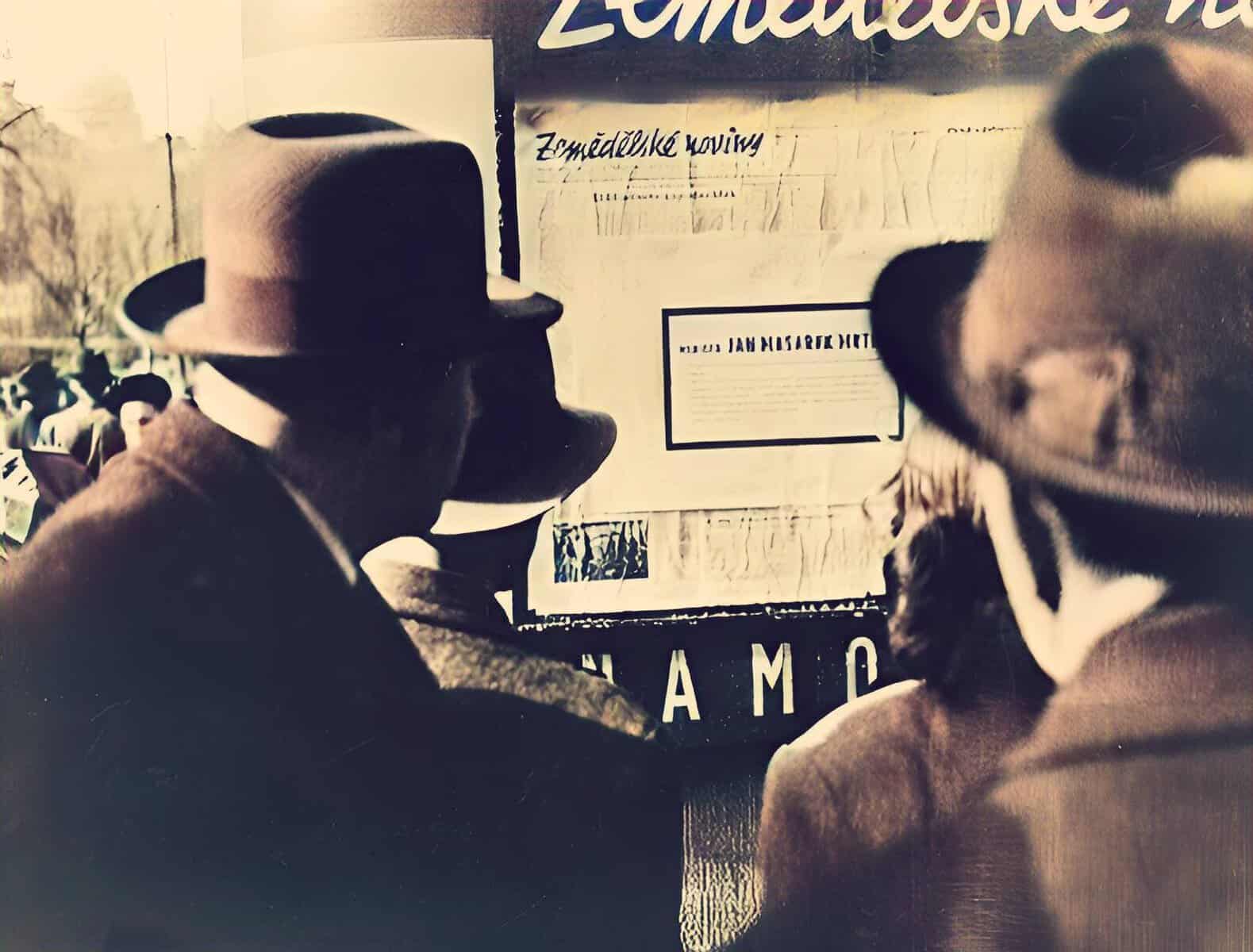 A black and white historical photo showing two individuals wearing hats, engaging with a display about news and music history, likely part of Past Daily's sound archive collection.