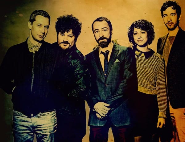 Vampire Weekend band members posing together in a promotional photo, highlighting indie rock music and the influence of past news, history, and music archives from pastdaily.com.