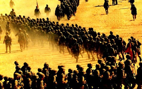 Mass migration of soldiers in a desert landscape, historical military movement, war history, army convoy, conflict zone, past daily archives, news history, music related to wartime events.