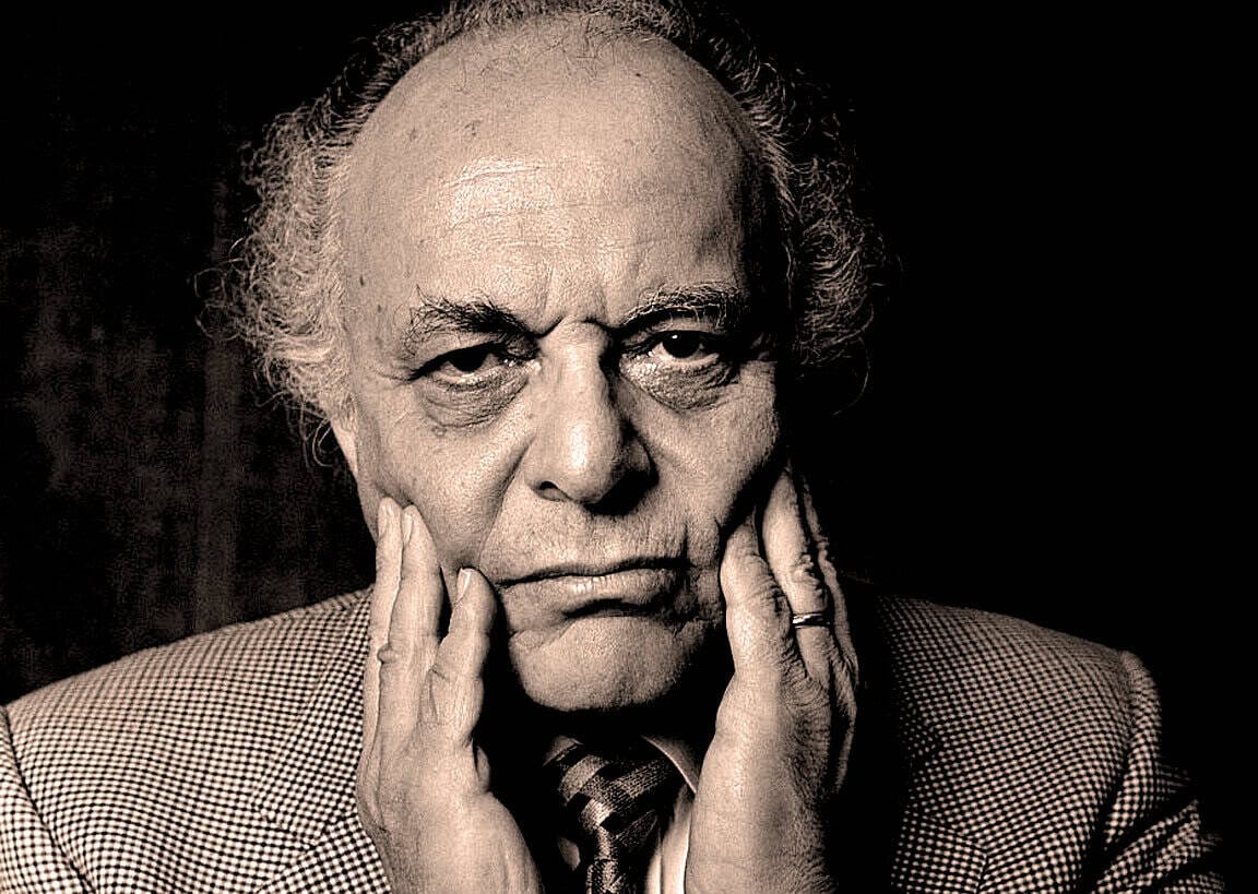 Portrait of an elderly man with a contemplative expression, emphasizing vintage news, history, and music archives.