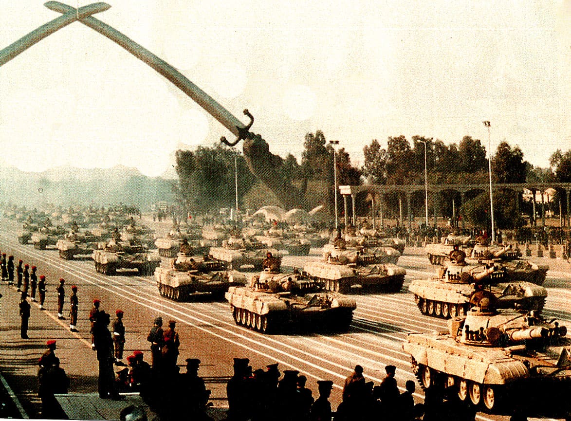 Tanks marching in a military parade with soldiers and spectators, historic military event, archive footage, 20th-century military history, news and music archive imagery.