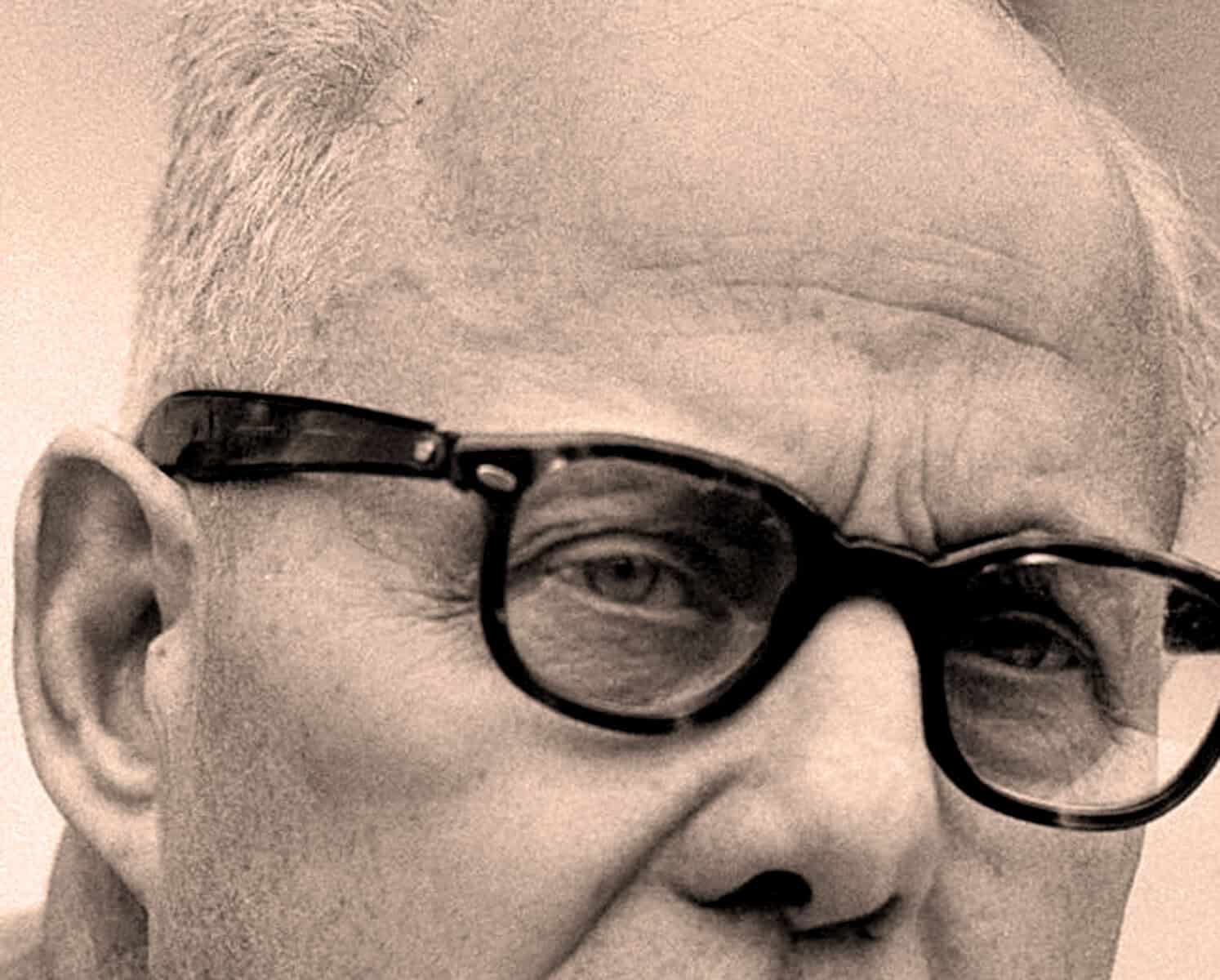 Close-up of Mahatma Gandhi's face with distinctive glasses, symbolizing peace, non-violence, and Indian independence. This iconic image represents influential historical figures and social activism.