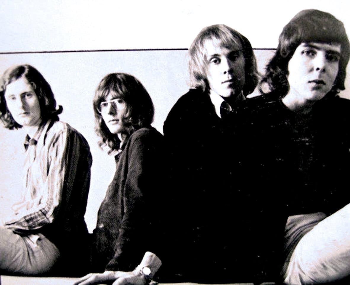 Vintage black and white photo of the Beatles, iconic British rock band, as part of a music history archive, showcasing influential bands from the 1960s, related to Past Daily's sound archive of news, history, and music.