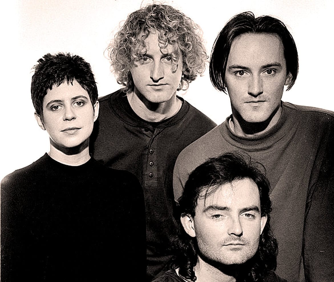 Black and white photo of The Cranberries band members, showcasing iconic 1990s alternative rock musicians. Perfect for news, music history, and classic band archives.