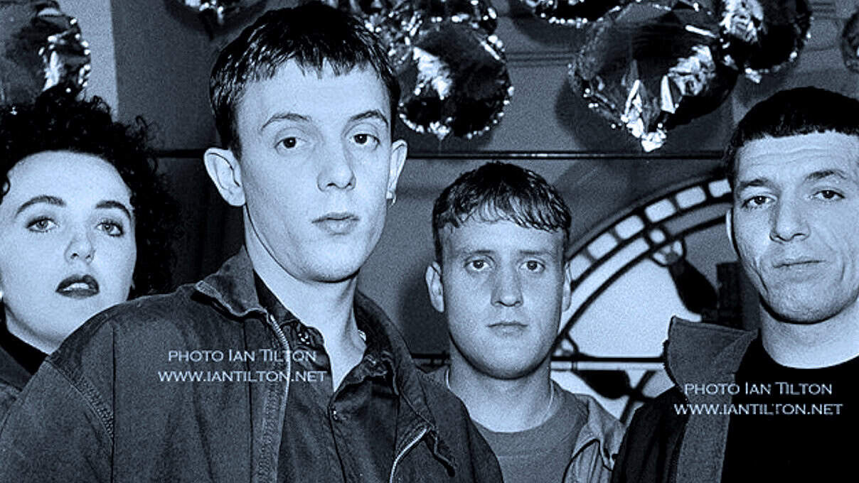 Young men and woman at a retro music and news event, capturing a moment for a sound archive of historical news, music, and cultural moments.