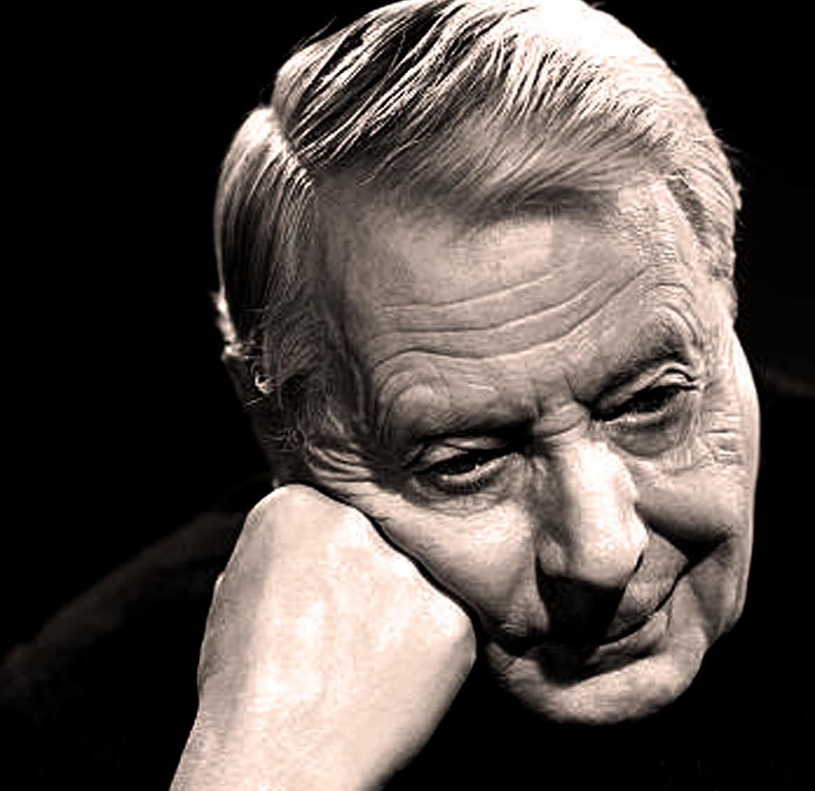Aged man with gray hair resting his head on his hand, black and white photo that evokes reflection, history, and nostalgia in a vintage portrait style.