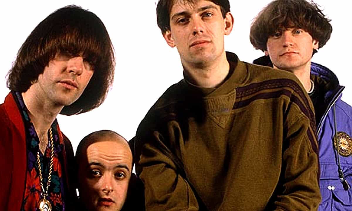 Photo of the band Blur, 1990s Britpop group, known for alternative rock and iconic music, featured on Past Daily sound archive of news, history, and music.