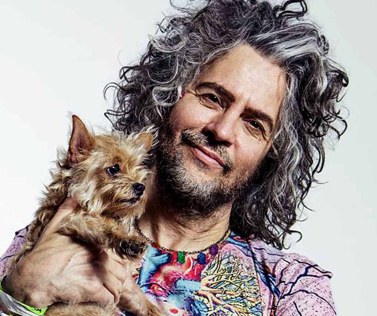 Vintage radio microphone on a news desk, symbolizing historic news broadcasting and media archives.