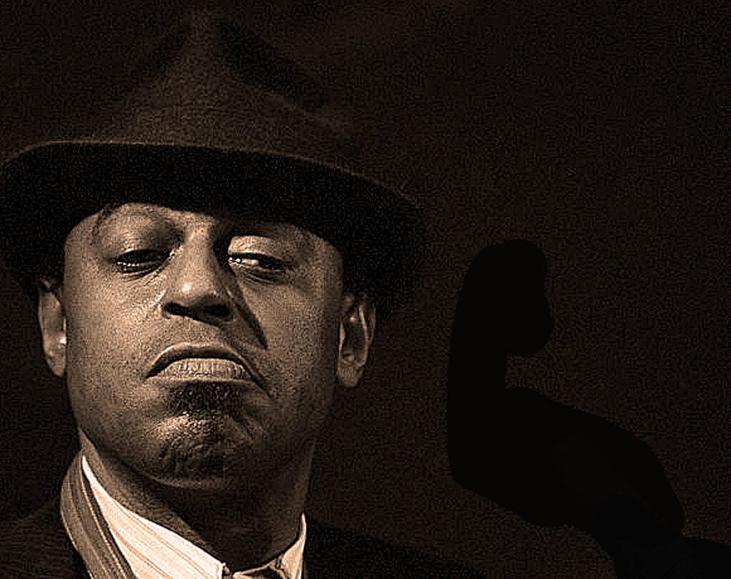 Bold black-and-white portrait of a jazz singer wearing a fedora, emphasizing vintage music and historical sound archive themes.