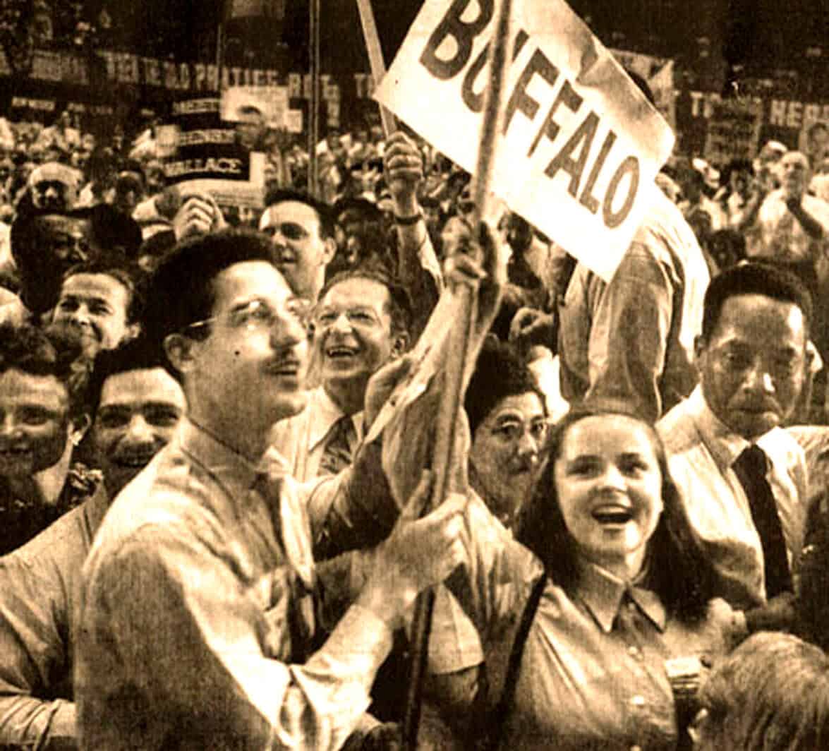 Flag-waving protesters at a historic demonstration, showcasing activism, social movements, and political engagement from the mid-20th century. A powerful image capturing collective voices for change.