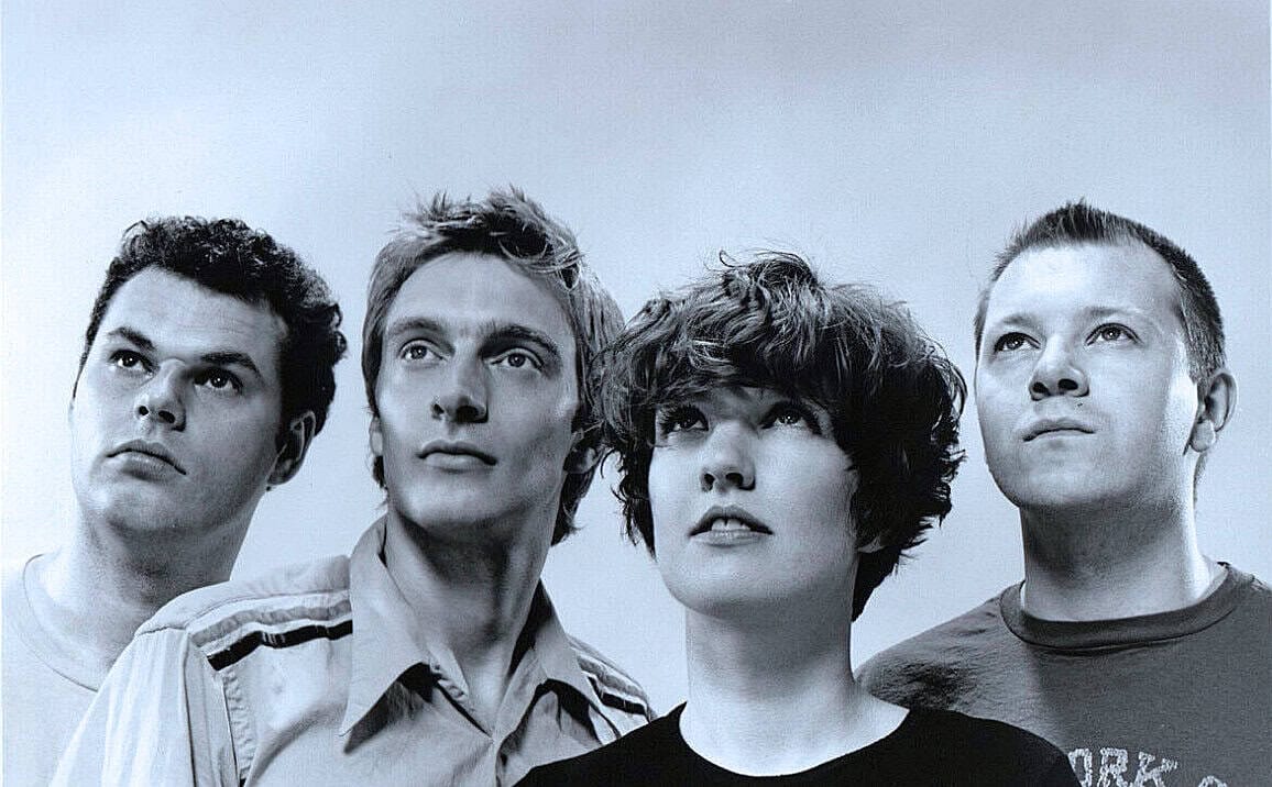 Vintage black and white photo of a popular 1980s pop rock band, highlighting music history and nostalgia.