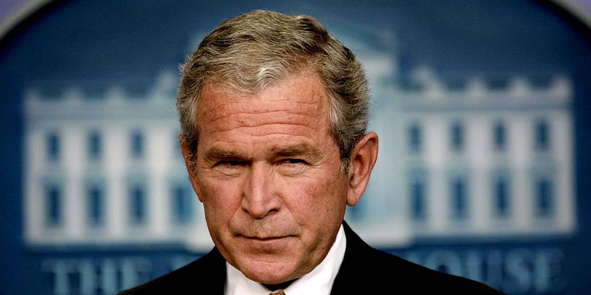 Former U.S. President George W. Bush speaking at a press conference in the White House, showcasing iconic political history and American leadership.
