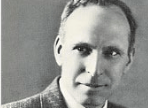 Vintage black and white portrait of a man, showcasing historical audio recordings and news archives on Past Daily's sound archive platform.