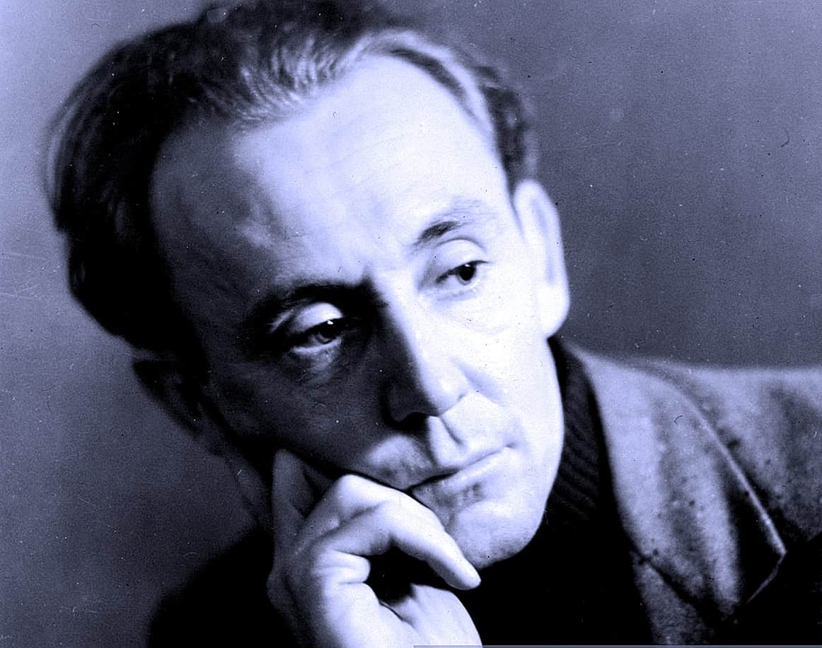 A black and white portrait of a thoughtful man, highlighting vintage music, news history, and archival audio preservation. Perfect for showcasing audio archives and historical sound recordings.