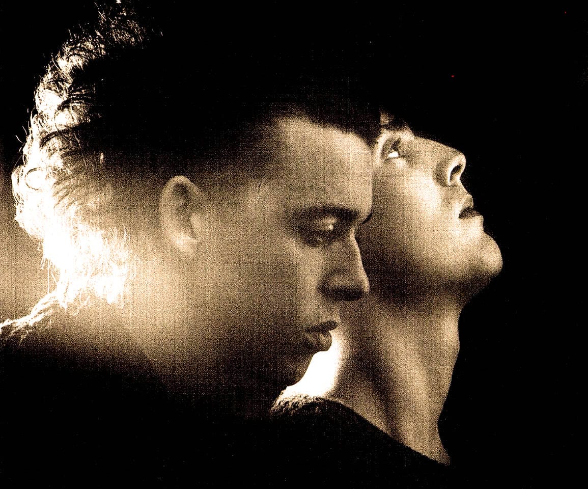 Vintage black and white photo of two women, emphasizing history and timeless music archive.