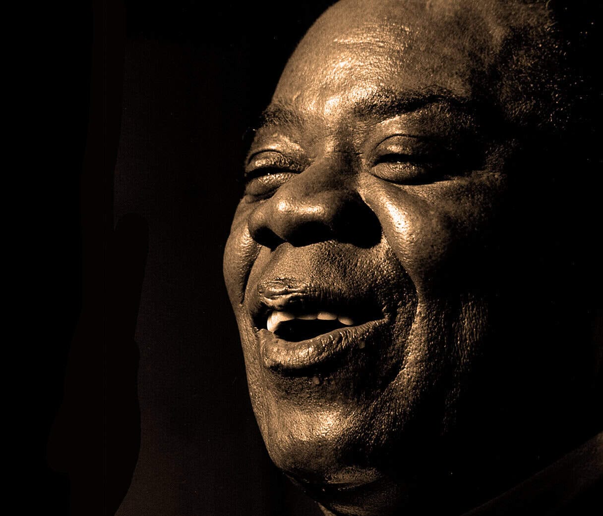 Soulful African American jazz singer performing with joyful expression, highlighting music history and cultural heritage, for archive website featuring news, music, and historical sound recordings.