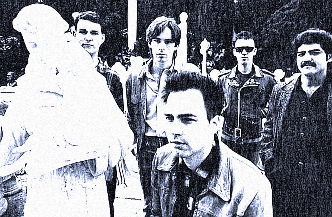 Vintage black and white photo of a band or music group at a public event, showcasing historic music culture and news archives for audio nostalgia.