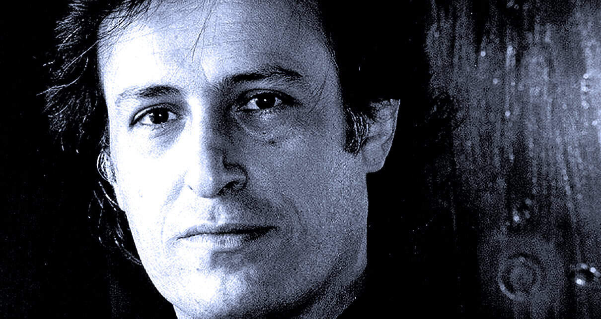 Portrait of a man in black and white, emphasizing news, music, and historical archives, related to Past Daily's sound archive of news, history, and music.