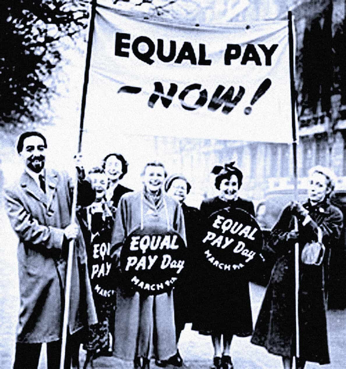 Equal pay protest rally promoting gender equality in the workplace, women holding signs for equal pay day, vintage black and white photo, social justice, labor rights movement, historical protest image.