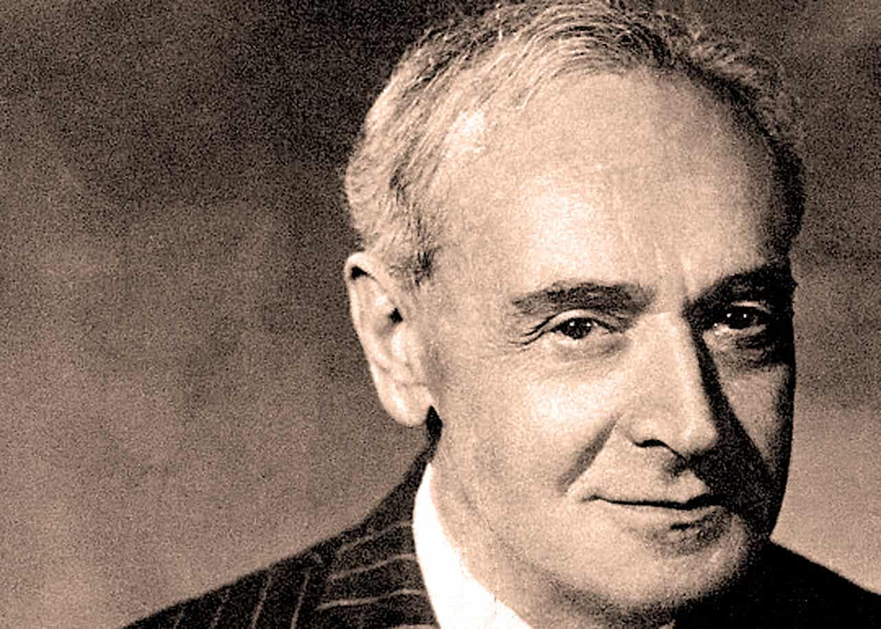 Vintage black and white portrait of a distinguished man, representing historic news and cultural figures in a sound archive of music, history, and news.