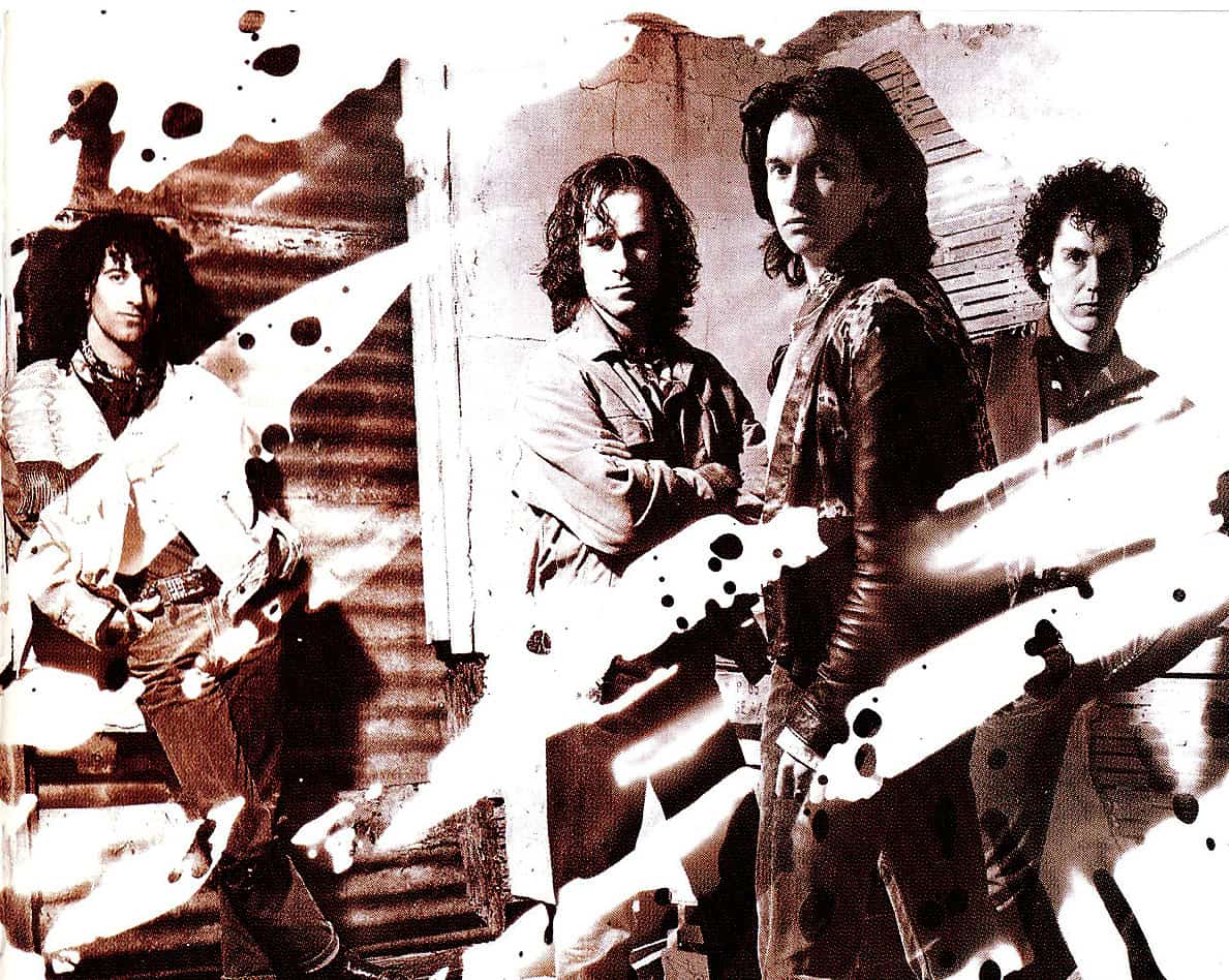 Mens Health magazine cover featuring stylish young adults with a background of soundwave graphics, highlighting music, news, and cultural archives.