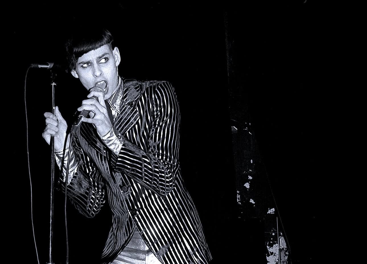 Broadcasting legend David Bowie performing iconic music live, showcasing his influence on rock and pop music history.