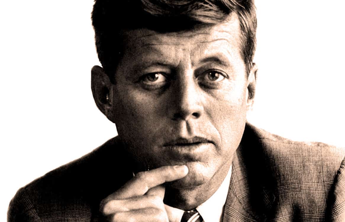 Thoughtful man in a suit, classic black and white portrait, reflecting on news and history, symbolizing audio archives and radio broadcasting, related to past daily news and music.