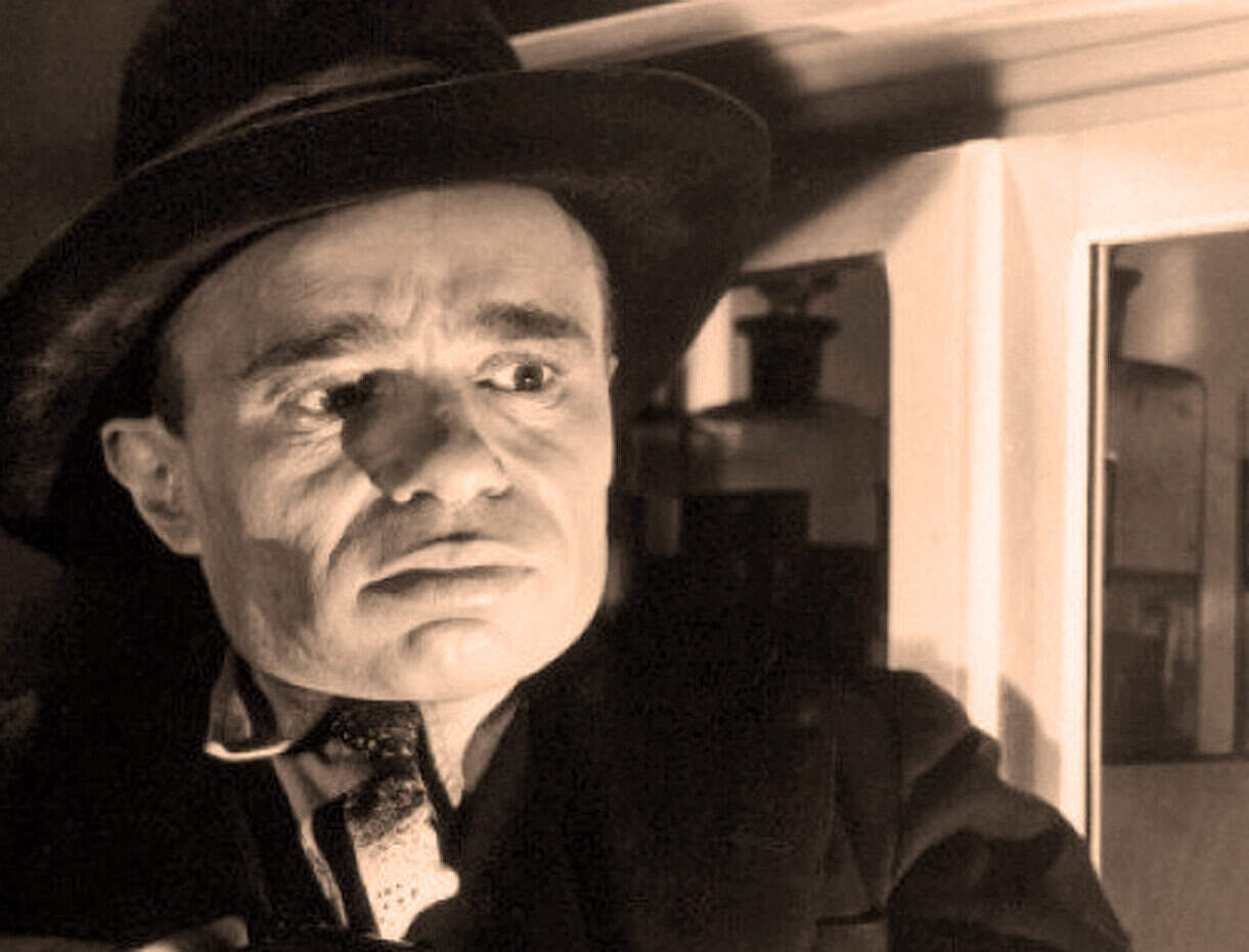 Close-up of vintage marionette puppet with detailed face and costume, representing historical entertainment, part of a vintage collection of music and news memorabilia for archival purposes.