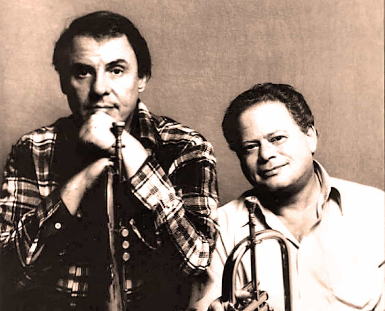 Vintage black and white photo of two musicians with a microphone, celebrating classic music and radio history, emphasizing nostalgia, audio recordings, and sound archive.