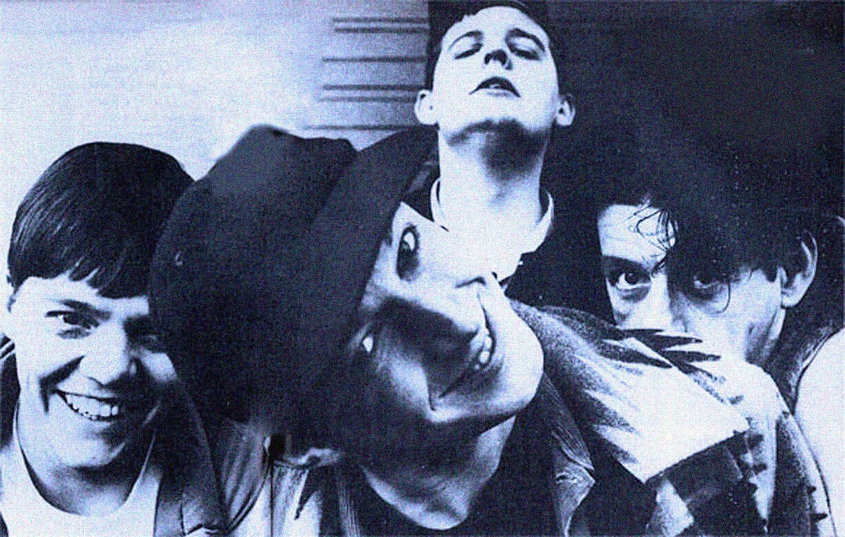 Vintage black and white photo of The Ramones, iconic punk rock band, showcasing their rebellious style, emphasizing music history, and nostalgia for 1970s punk music culture.