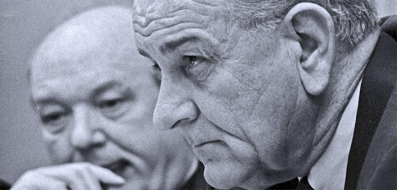 Historical black and white photo of two elderly men engaged in conversation, emphasizing news, history, and music archive relevance.