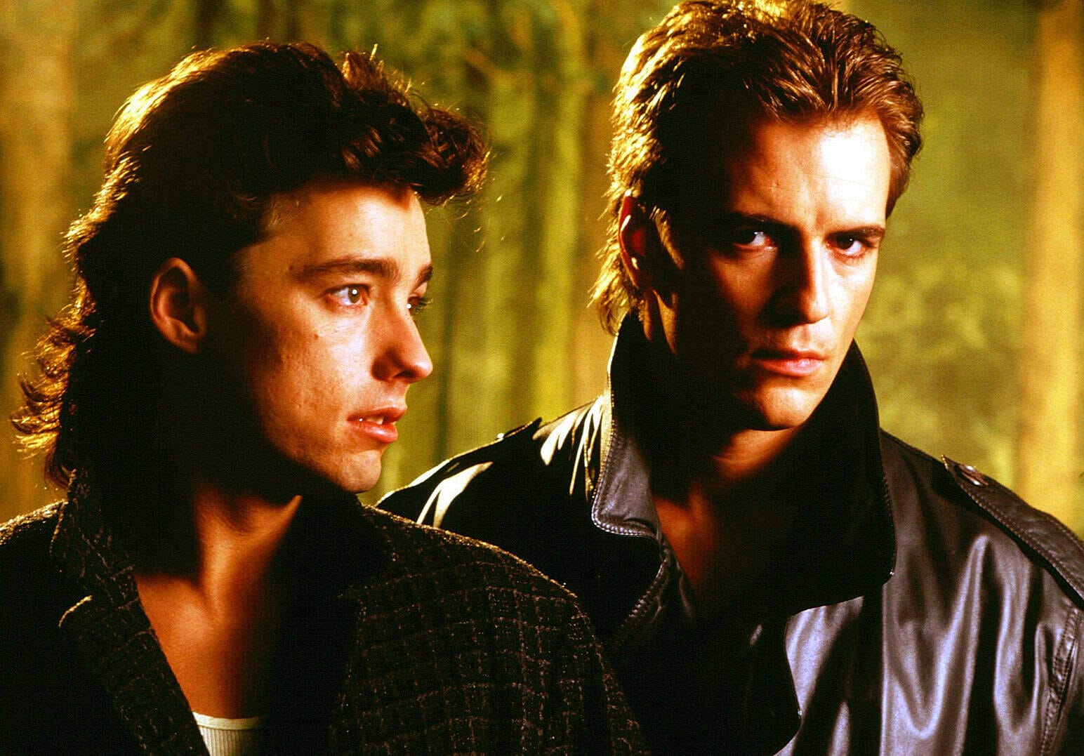 A Sound Archive of News, History, and Music featuring a classic movie scene with two male characters in a wooded area, highlighting nostalgic entertainment and cultural history.