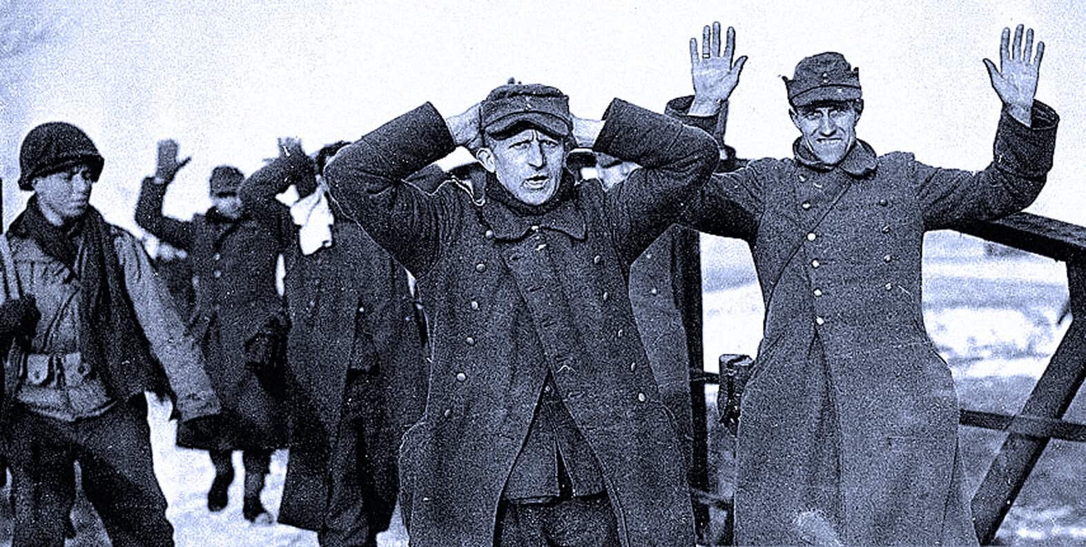Exposed soldiers in winter uniforms during wartime, possibly during WWII, demonstrating hardships of historical military conflicts and wartime resilience.
