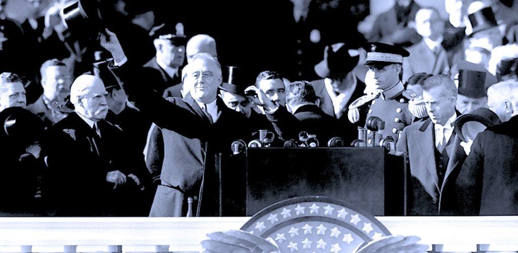 Famous historical figure giving a speech at a patriotic event, with military officers and citizens present, capturing a moment of history, news archive, and American history documentation.