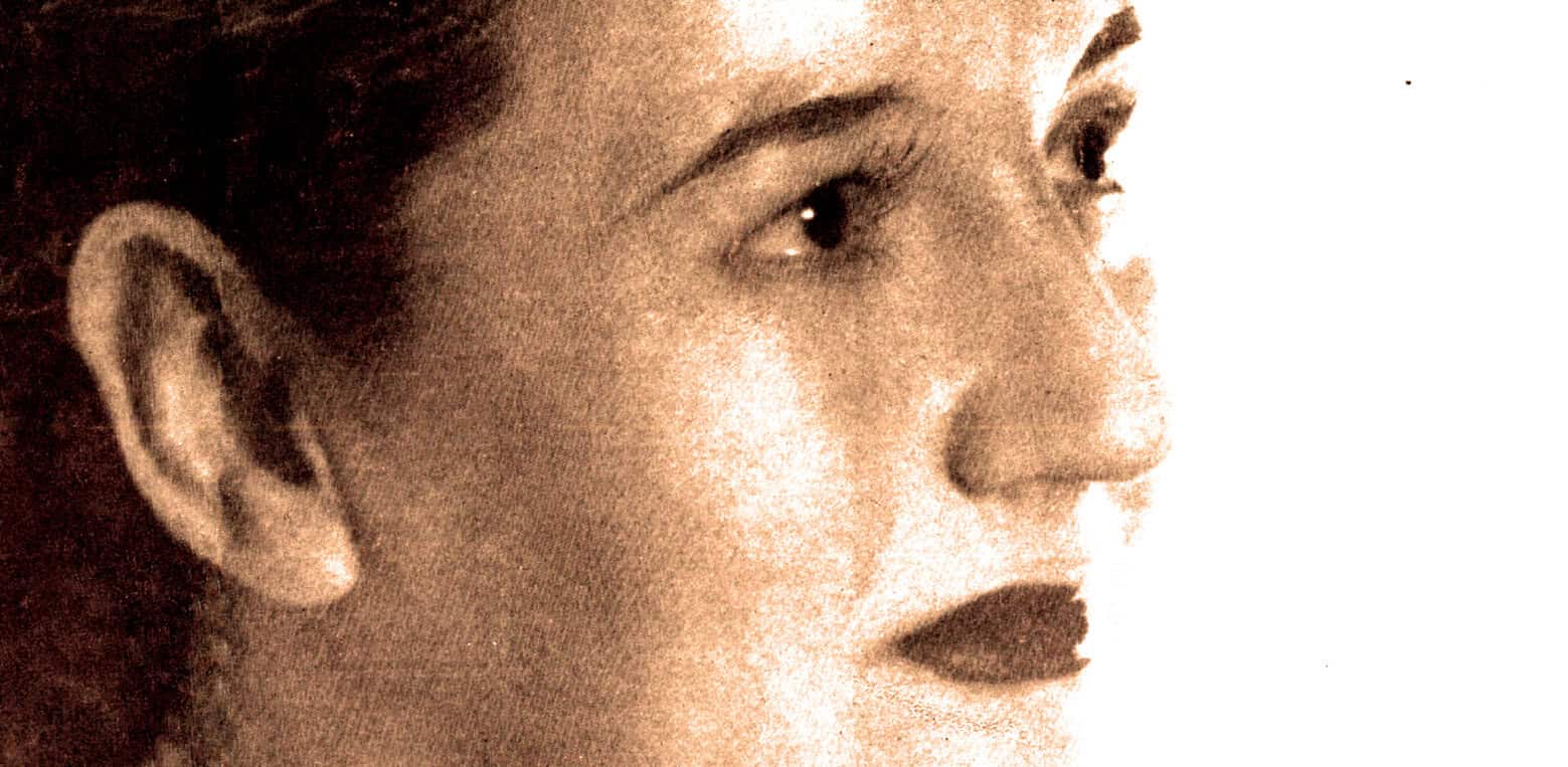 Close-up portrait of a woman with vintage style, emphasizing music, news, history, sound archive, and audio recordings.