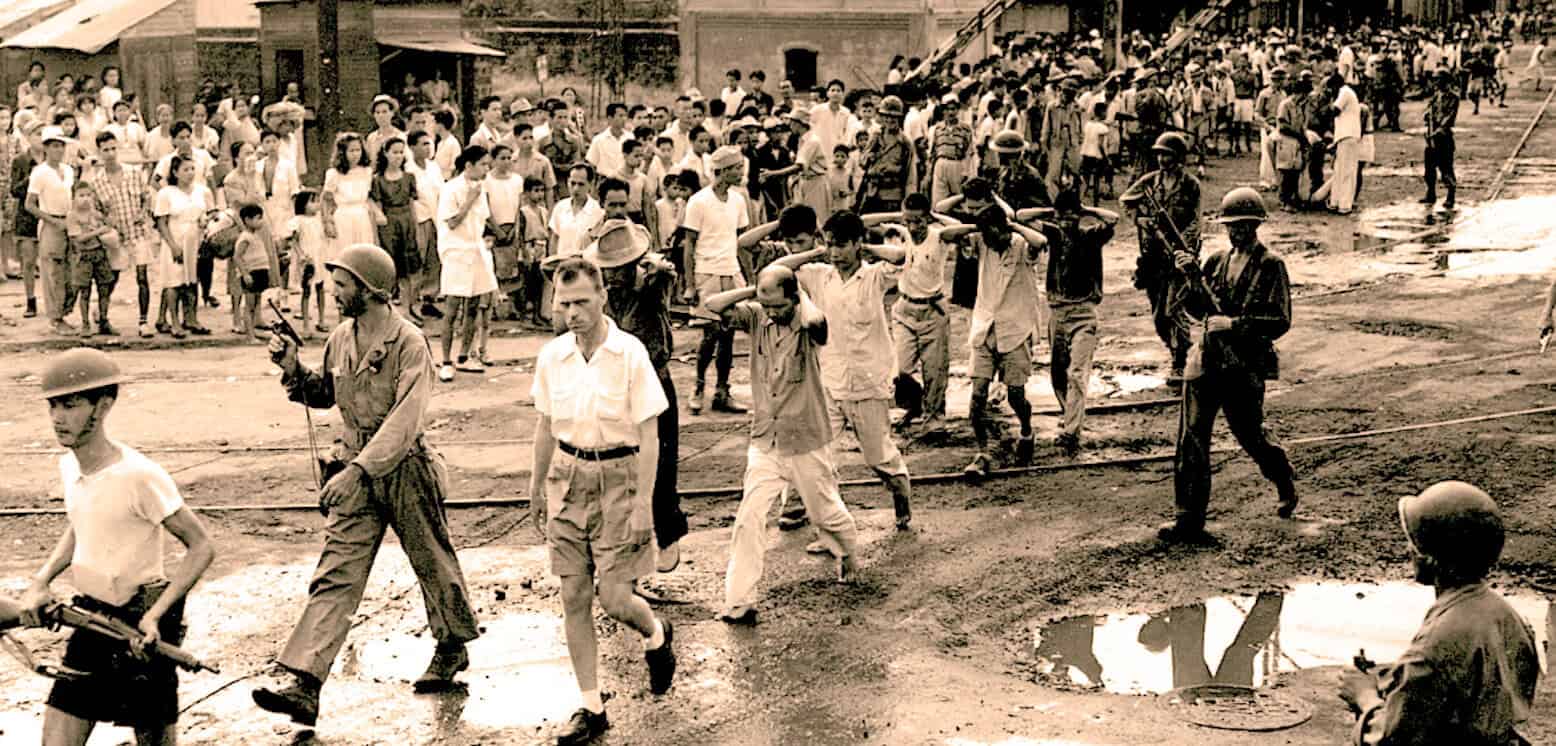 Nazi soldiers patrol street with civilians and children, historic 20th-century footage, wartime news archive, social and political upheaval, historical conflict footage, pastdaily sound archive, history and news history, vintage military and civil unrest scene.