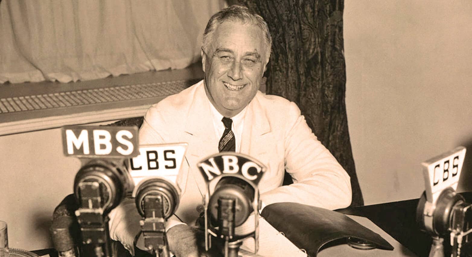 Radio broadcast of historical news and music archives at Past Daily, featuring vintage microphones and a speaker, emphasizing radio broadcasting, news, history, and music preservation in a vintage setting.