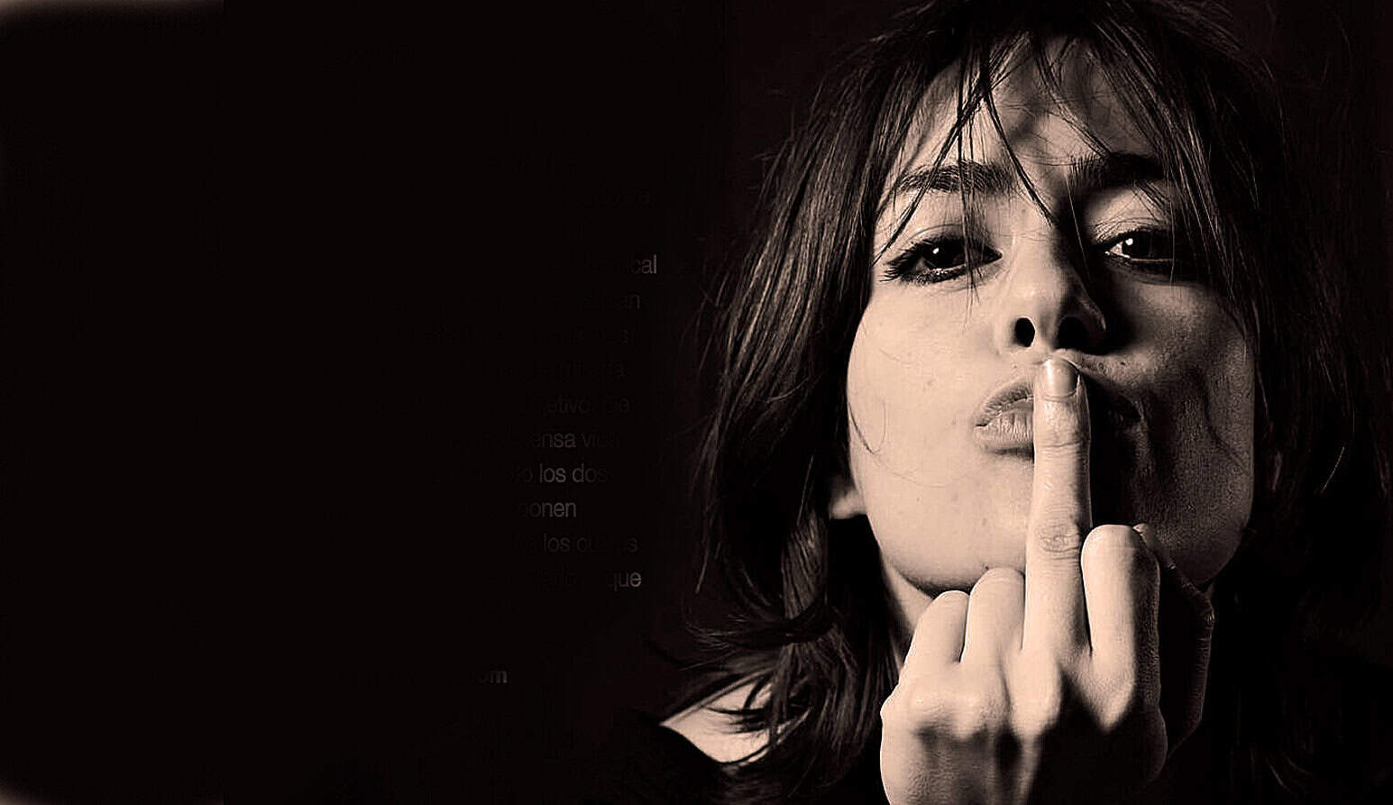 Silhouette of a woman with her finger pressed against her lips, symbolizing silence or secrecy, with a dark background emphasizing mystery and emotion, suitable for themes of news, history, and music archives.