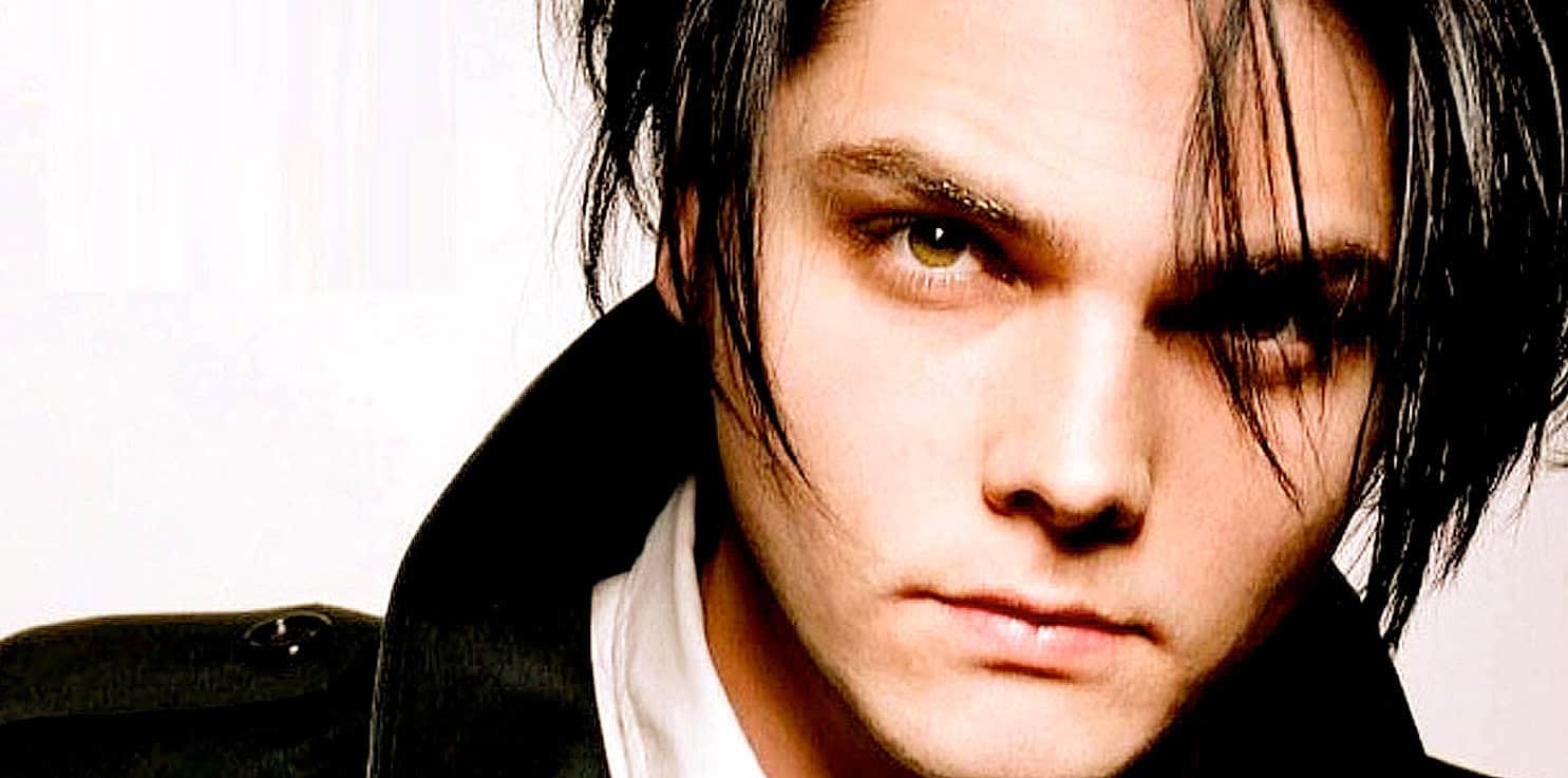 Desiree Del Valle close-up portrait with edgy hairstyle, emphasizing music, history, and news archive themes.