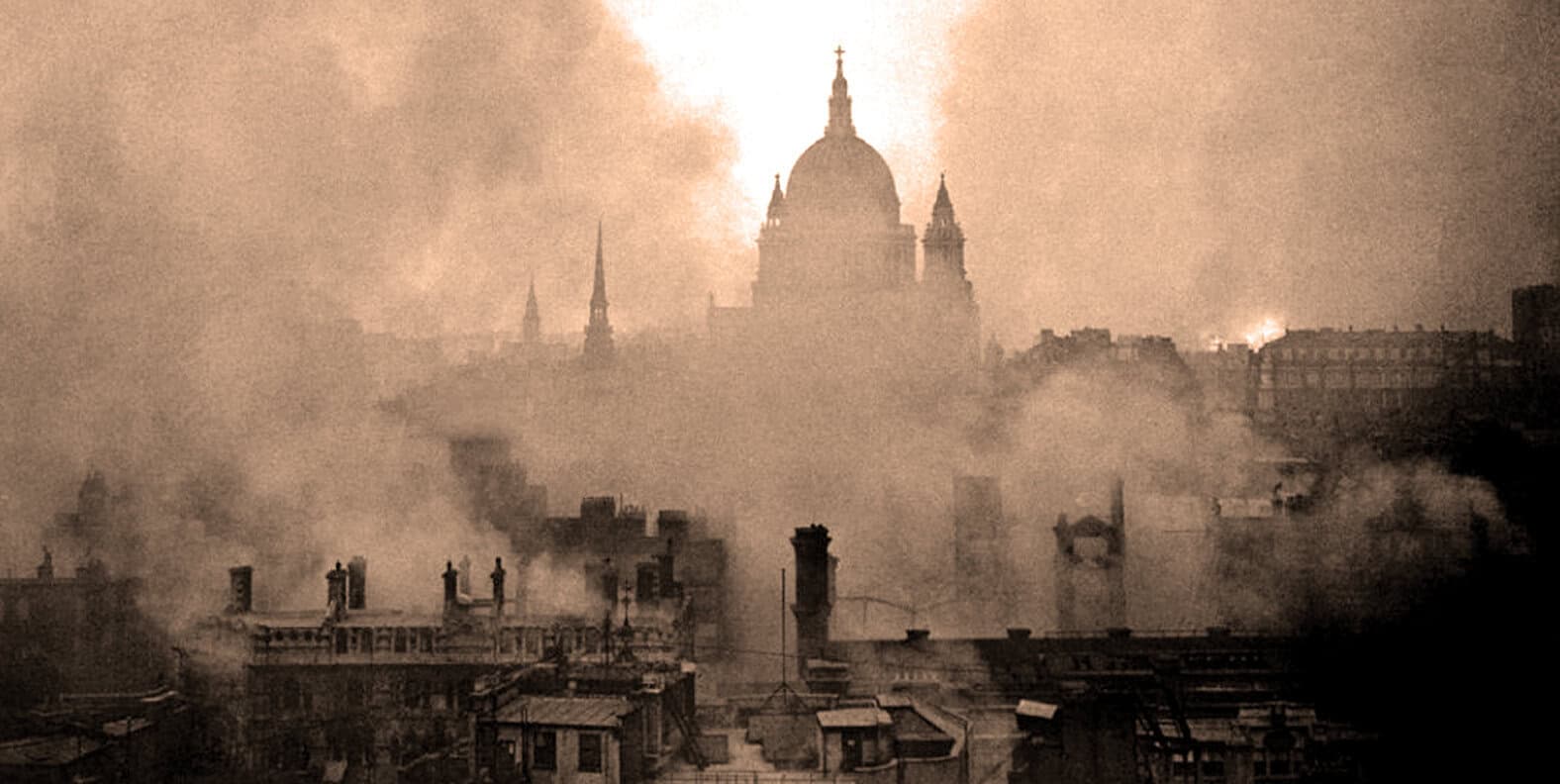 Aerial view of Paris with smoke and fire over rooftops during a historic event, showcasing the city’s architecture and urban landscape amidst a city crisis or disaster scenario.
