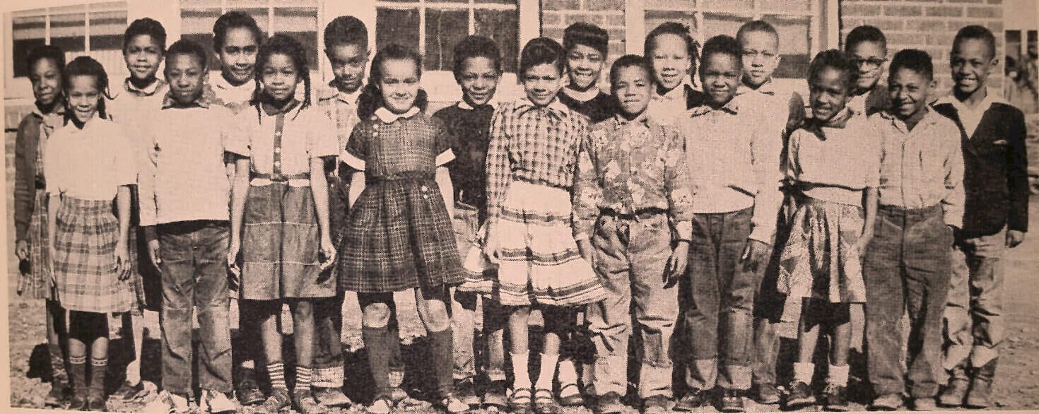Children school group photo from historical archives, showcasing an educational setting and diversity, relevant for news and history sound archive collections.
