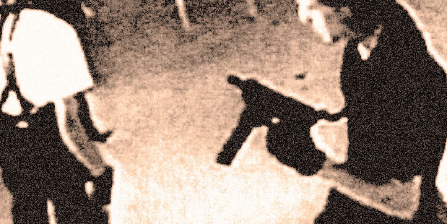 Silhouette of two people walking in a sepia-toned image, evoking historical and nostalgic themes related to news, music, and history archives.