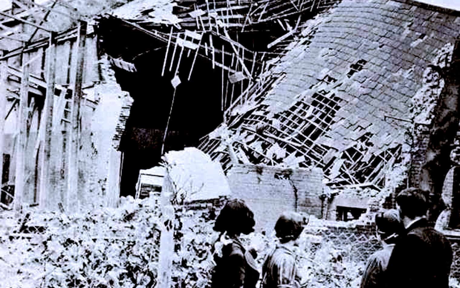 Collapsed building wreckage from historical earthquake disaster, debris and ruins with onlookers, vintage black and white photo.