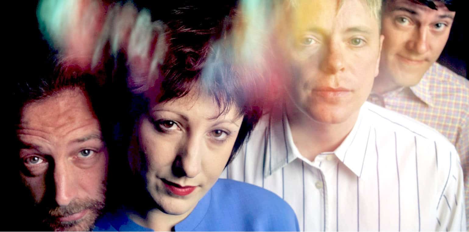 Historic band photo from the 1990s, featuring musicians with a nostalgic connection to music history, related to news, interviews, and classic sounds showcased on Past Daily.