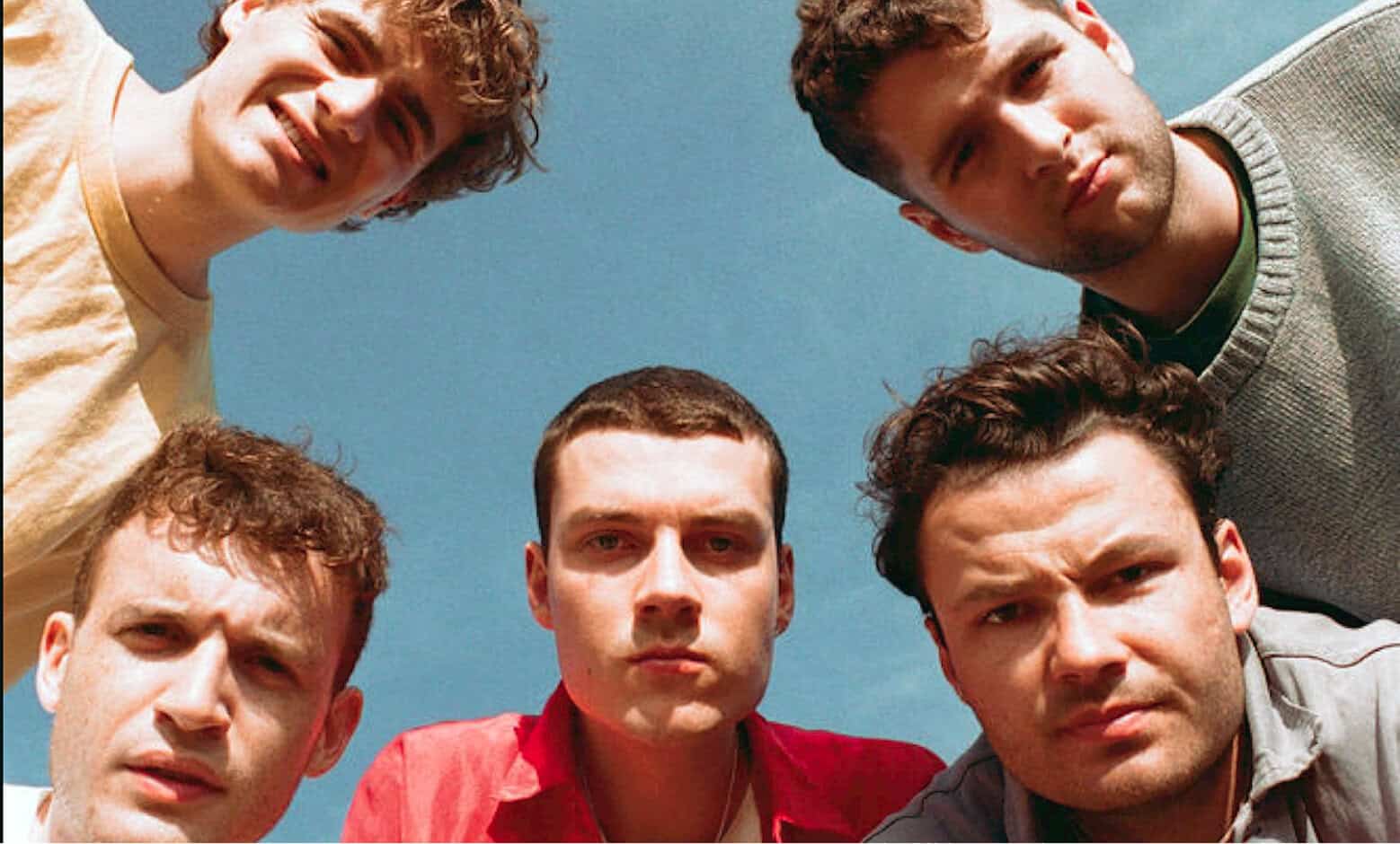 Brian-jonestown-massacre-rock-band-group-photo-on-blue-sky-background-high-quality-band-music-archive.