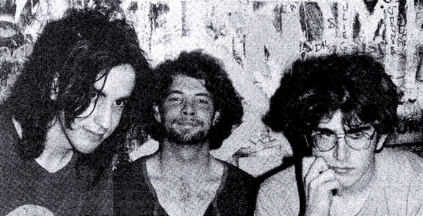 Black and white photo of three young people with lively expressions, emphasizing nostalgic music and cultural history.