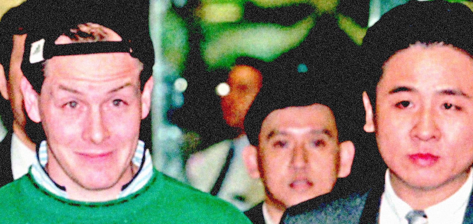 Andrew Yang in a crowd during a political event, showcasing diverse headlines from news, history, and music archives.