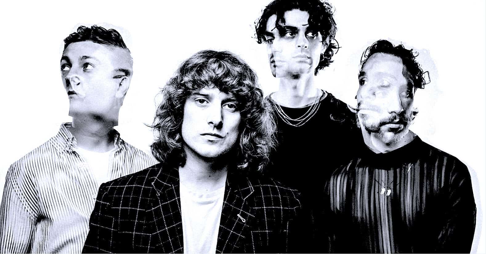 Vintage black and white image of a punk rock band, featuring four members with distinctive hairstyles and fashion, capturing the essence of 1980s alternative music.