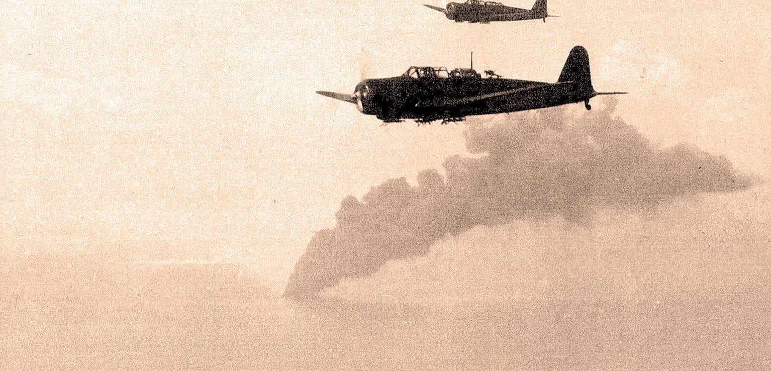 Vintage WWII fighter planes flying in formation over the sky.